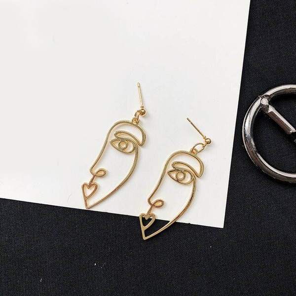 Zinc Alloy Wire Face Earrings