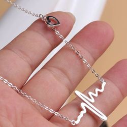 gold & silver heartbeat necklace