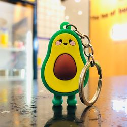smiling & winking avocado car keychain