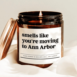 smells like youre moving to ann arbor candle funny moving gift housewarming soy candle new home gift