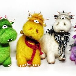 Funny dragon toy of different colors as a gift