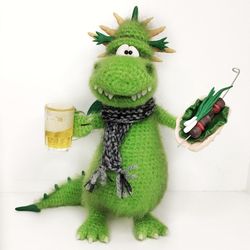 Crochet dragon with beer and kebab