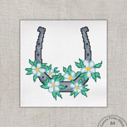 Spring horseshoe in cross stitch pattern