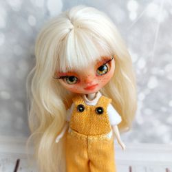 Small beautiful doll with long hair. doll with Asian style eyes. doll with eyes.