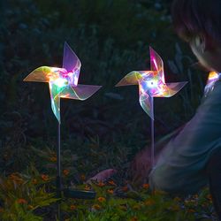 luminous led solar laser magic color windmill light, outdoor ground plug-in lamp, courtyard garden landscape decoration