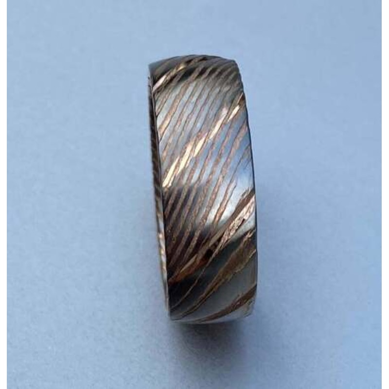 Dazzling_Damascus_Steel_Wedding_Ring_Set_with_Wood_Case_–_Perfect_Bands_for_Men_and_Women (1).jpg