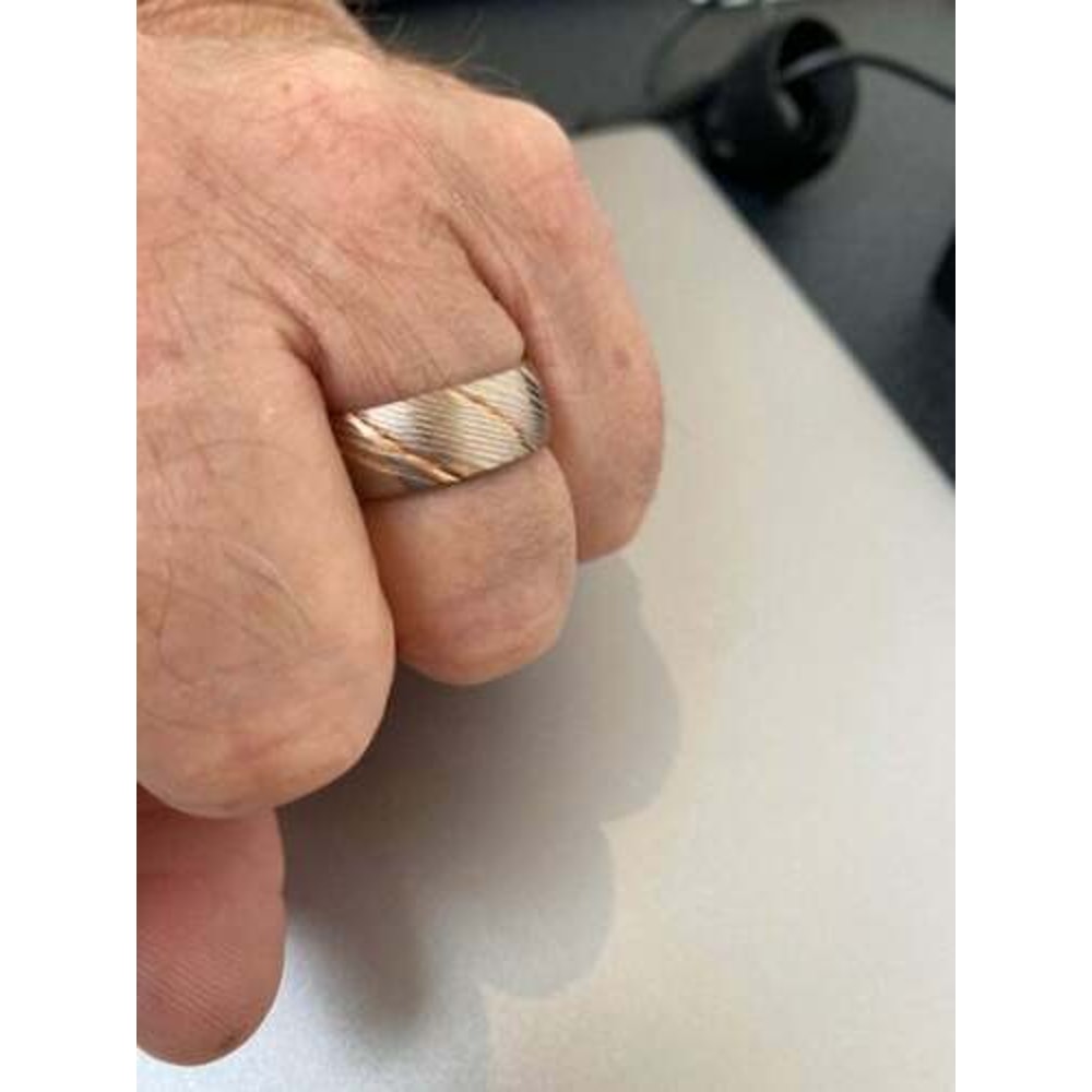 Dazzling_Damascus_Steel_Wedding_Ring_Set_with_Wood_Case_–_Perfect_Bands_for_Men_and_Women (2).jpg