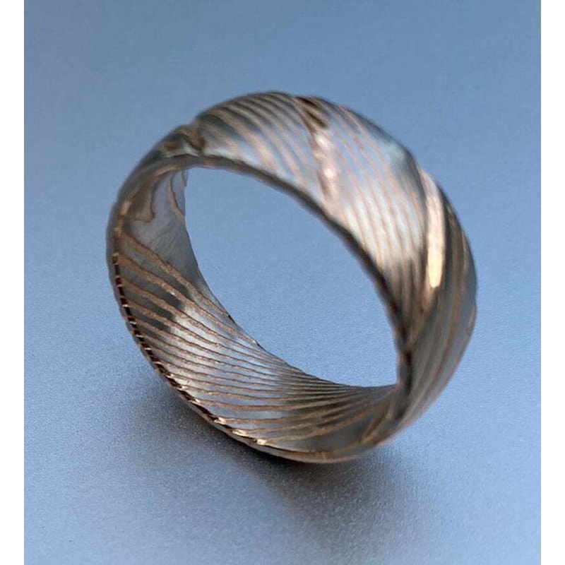 Dazzling_Damascus_Steel_Wedding_Ring_Set_with_Wood_Case_–_Perfect_Bands_for_Men_and_Women (5).jpg