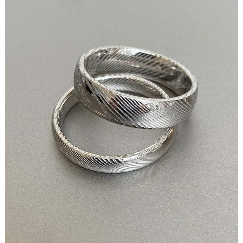 Sophisticated_Damascus_Steel_Wedding_Ring_Set_with_Wood_Case – Ideal_Bands_for_Men_and_Women (1).jpg