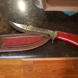 Custom handmade Damascus Steel dagger/knife with leather sheath