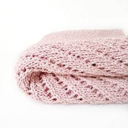 Hand-Knit Pink Baby Blanket with Delicate Lace Pattern and Silky Texture. Perfect Gift for Newborns. Handcrafted blanket