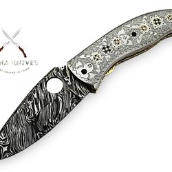 Handmade damascus fire pattern folding knife with engraved handle