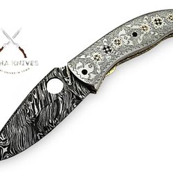 handmade damascus fire pattern folding knife with engraved handle