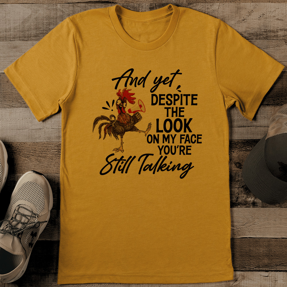 And Yet Despite The Look On My Face Youre Still Talking Tee 1