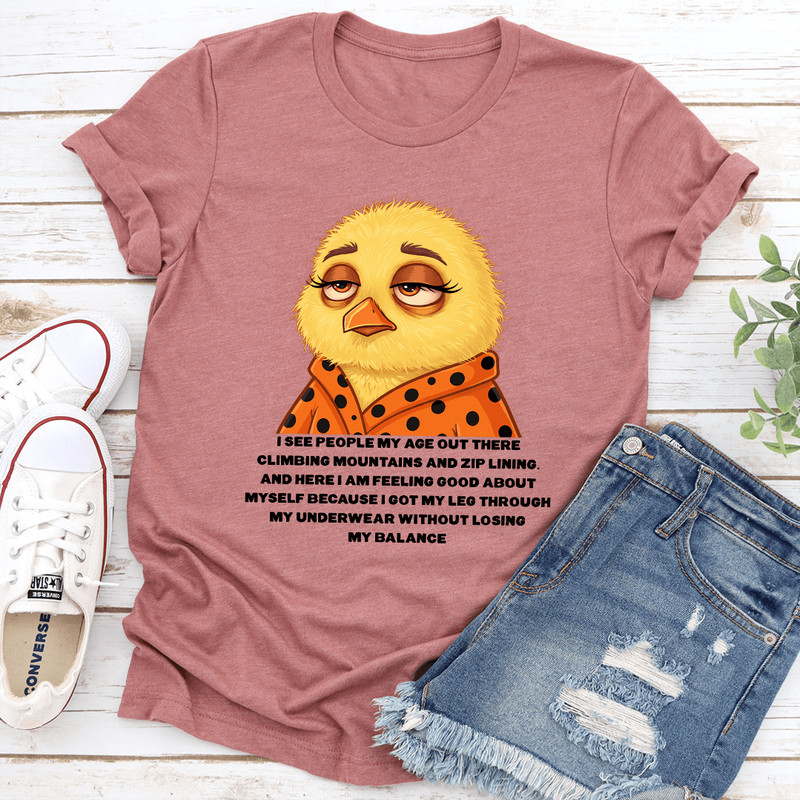 I See People My Age Out There Climbing Mountains And Zip Lining And Here Tee 0