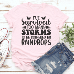 i've survived too many storms to be bothered by raindrop tee