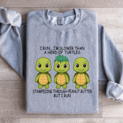 i run i'm slower than a herd of turtles sweatshirt