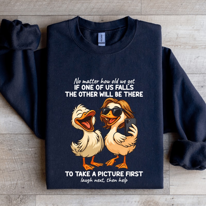 No Matter How Old We Get If One Of Us Falls Sweatshirt 1