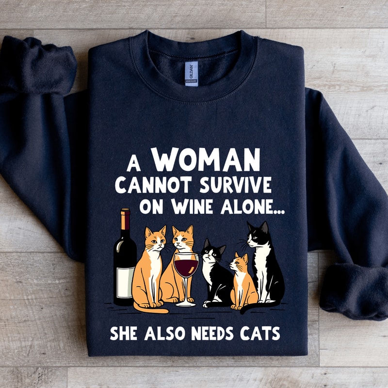 A Woman Cannot Survive On Wine Alone Sweatshirt 1