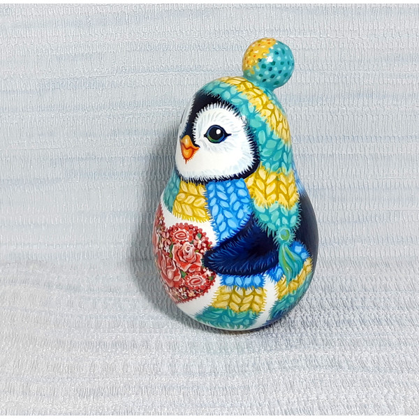 A cute penguin with a heart of roses  Rolly polly toy , Musical toy (19).jpg