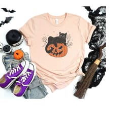 black cat on pumpkin shirt, sweater for fall, black cat shirt, halloween black cat design, unisex t-shirts