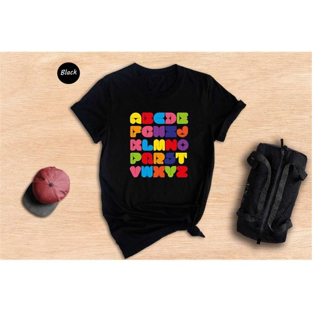Colorful Alphabet Shirt, Rainbow Shirt, Teacher Shirt, Rainbow Teacher Shirt, Gift For Teacher, Unisex T-Shirt