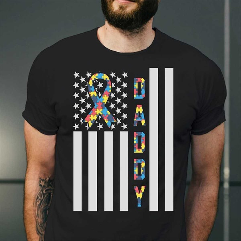 Proud Of Autism Daddy American Flag Shirt, Puzzle Autism T-Shirt, Autism Awareness Gift For Dad, Unisex T-Shirt