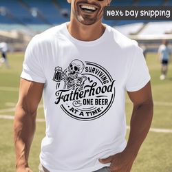 surviving fatherhood one beer at a time shirt, funny father shirt, husband shirt, fathers day gift, fatherhood shirt