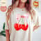 Cherry Coquette Shirt, Comfort Colors Valentine's Day Shirt, Cherry Lover Gift, Cute Hearts and Bow Tee, Soft Girl Era Shirt.jpg