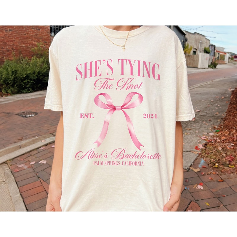 Personalized Coquette Bow Bachelorette Shirts, Custom Bachelorette Party Shirt, She's Tying the Knot Bridal Party, Custom Bride Gift 1.jpg