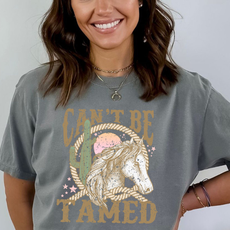 Can't Be Tamed T-Shirt Western T-shirt Women's T-shirt Grey T-shirt Western Crewneck Western Aesthetic Clothing.jpg