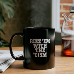 Rizz 'Em Wth The 'Tism 11oz Black Mug