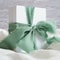 frayededgerippedsilkribbonfordiyweddingsgiftpackagingdecorationgreen.png