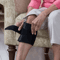 Adjustable pressure support for knee discomfort