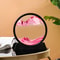 movingsandartpictureroundglass3dpink.png