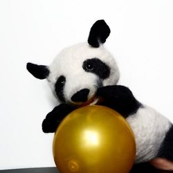 Hand puppet Panda for the puppet theater.