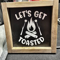 let’s get toasted sign