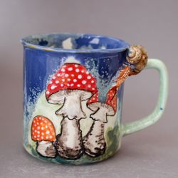Beautiful tea coffee cup Snail and amanita ,Surprise mug ,Mushroom cup, Blue green crystalline glaze, Retro Style mug, Handmade Ceramic Mug ,snail figurine, colorful mug Nature lover gift, beautiful mug Cool gift designer mug