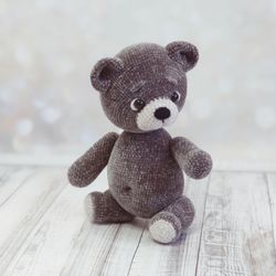 Crocheted gray teddy bear. Soft figurine of a bear for a child. Amigurumi toy. Birthday gift for a girl.