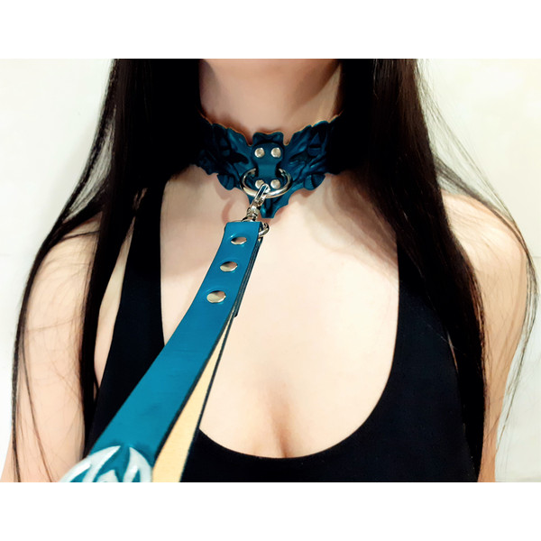 Turquoise leather bdsm collar in the form of oak leaves.jpg
