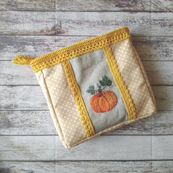 Cosmetic bag wiht embroidered pumpkin
