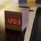 woodenbedsideclockwalnutorangrlight.png