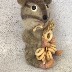 Raccoon , a toy made of wool