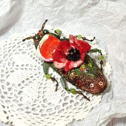 Large beetle brooch with poppy flower. Beetle embroidered with a glass petal