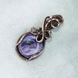 The original author's wire pendant with purple charoite. An anniversary gift to my wife, a gift to myself