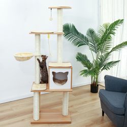 Cat tree tower with a cat condo and a nest