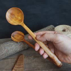 Handmade wooden spoon from natural birch wood for cooking or serving