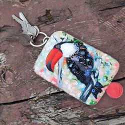 Leather key case with toucan bird embroidery, durable, original accessory