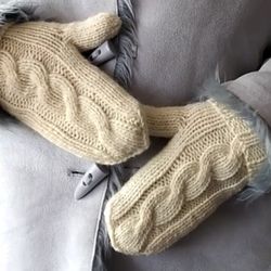 White warm hand-knitted mittens