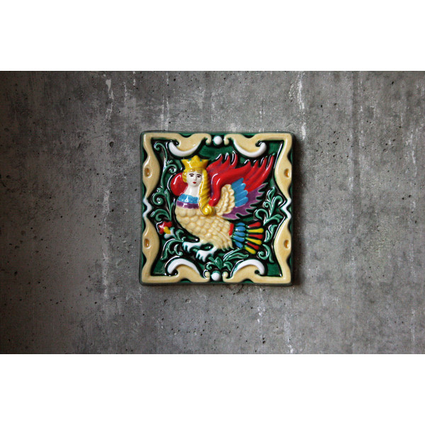 Ceramic handpainted relief tile featuring a mythological creature of Russian legends Sirin